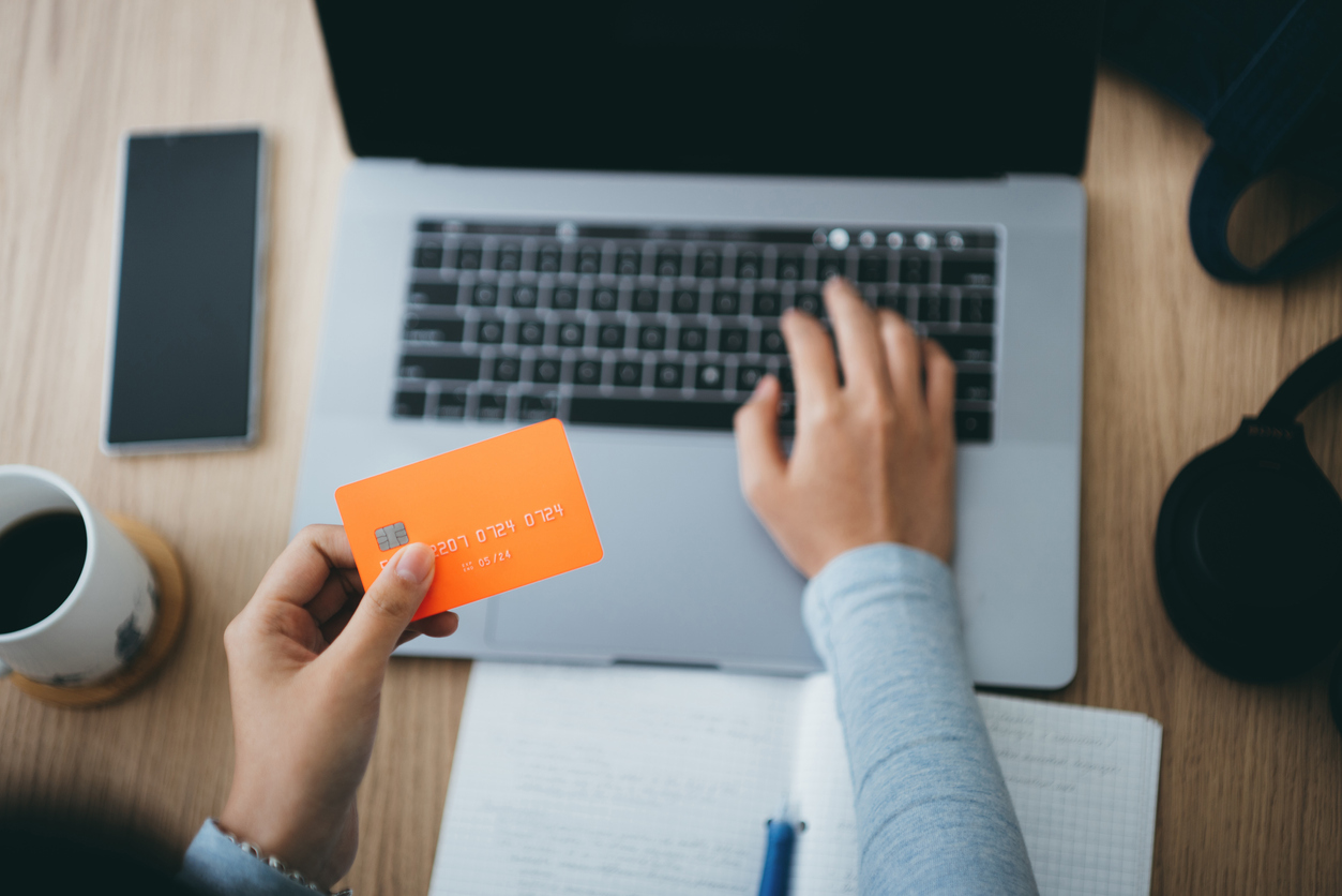 Woman holding bank card